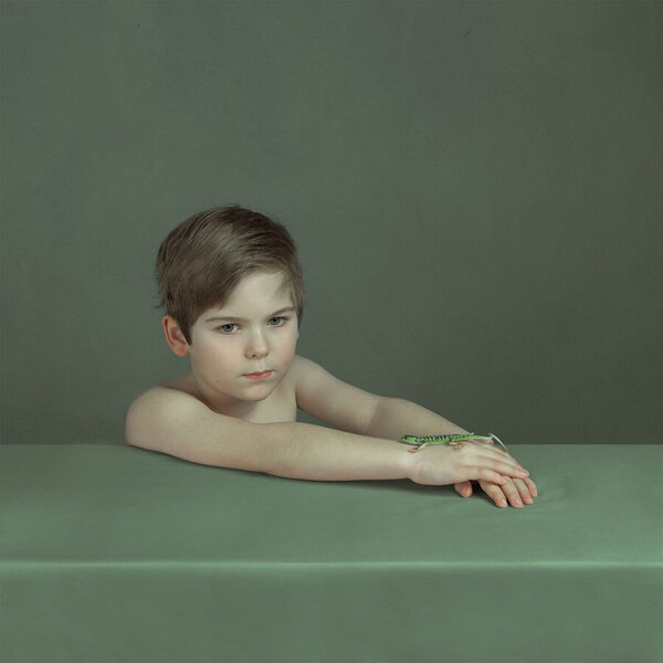 Photograph Natalie Vorontsoff Boy With Lizard on One Eyeland